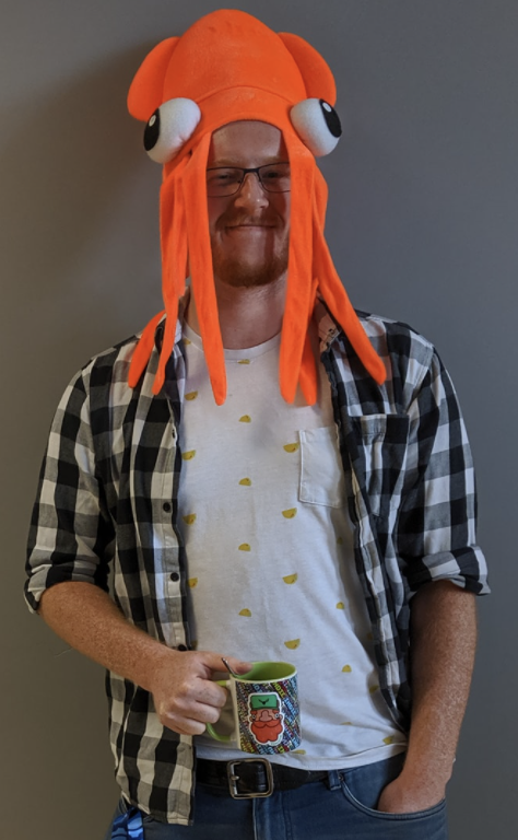 Photo of Gabriel Le Breton with a squid on his head